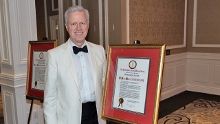 Dr. Adzick with his award