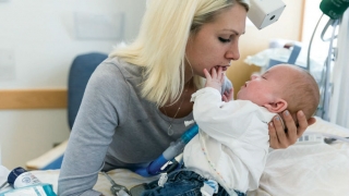 Kristen holding her son, Vinny