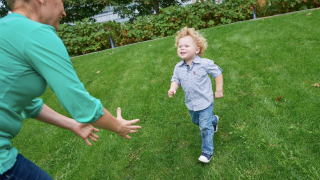 young boy IBD patient running to mom's arms
