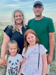 When Emma (front, right) was diagnosed with celiac disease, her family stepped up to help her deal with dietary and medical changes. With her are her sister Madison, 6, and parents Jennifer and James.