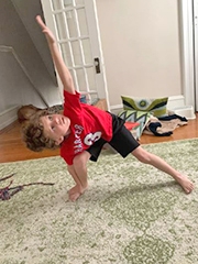 Young child doing yoga