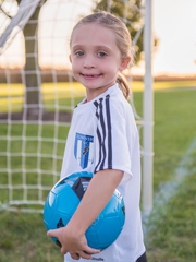 Abby holding a soccer ball