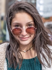 GI patient smiling wearing sunglasses outside
