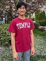 Dan with a Temple shirt on