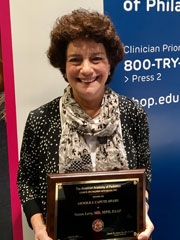Susan Levy honored with the Arnold J. Capute Award