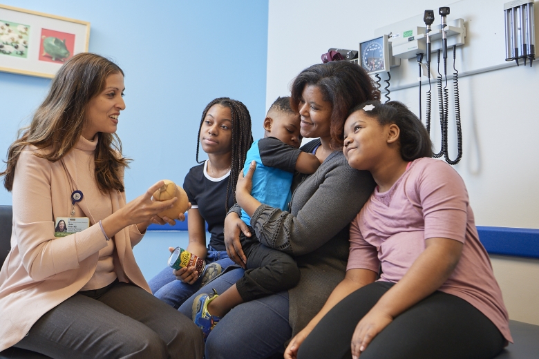 family discussing nutrition with caregiver