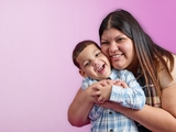 Mother and son smiling