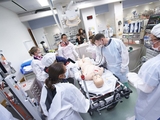 Simulation team in Emergency Room with mannequin