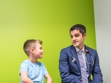 Physician speaking with patient