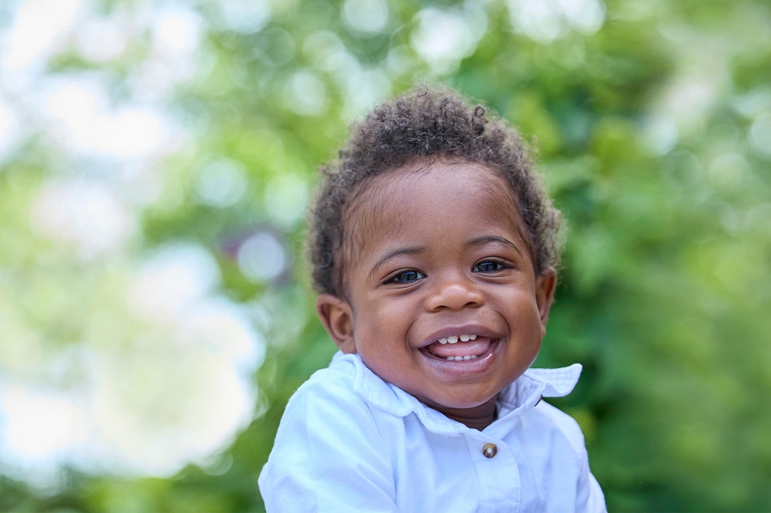 African American boy smiling in the hospital garden