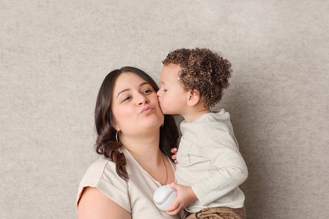 son kissing his mother on the cheek