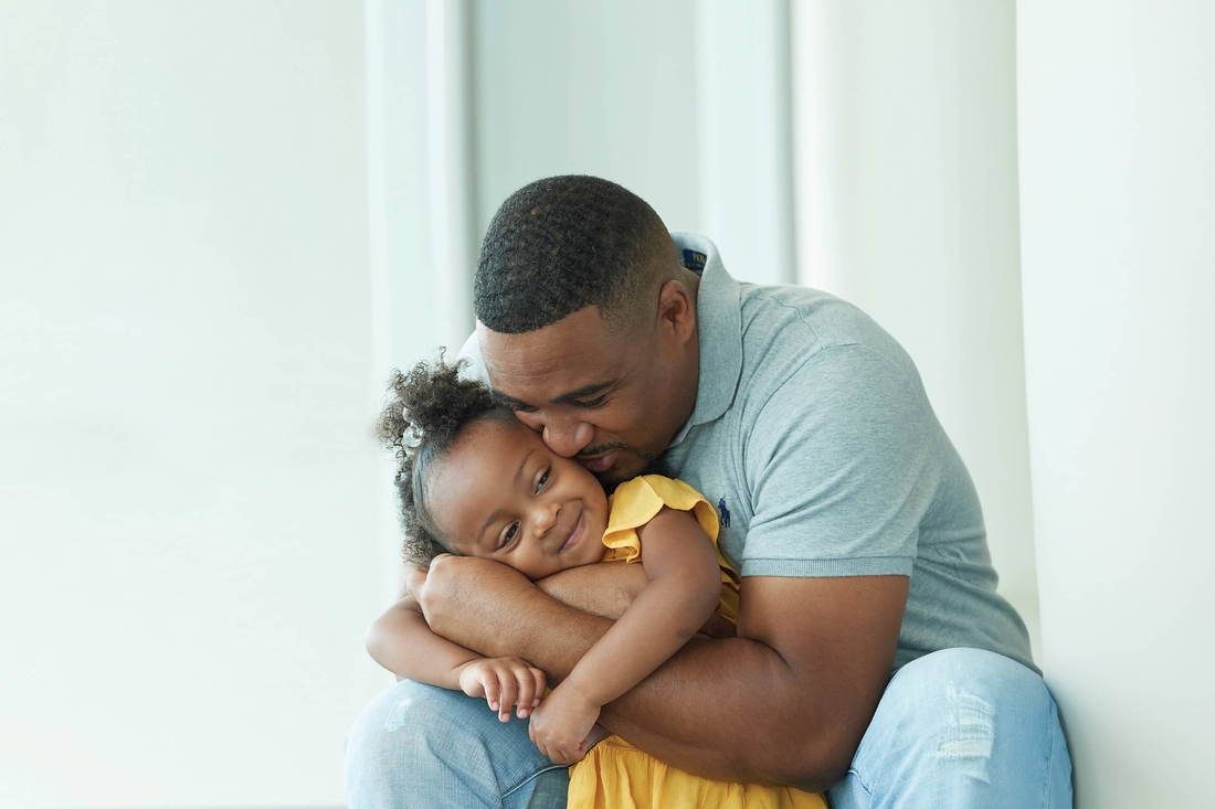 Father hugging his daughter