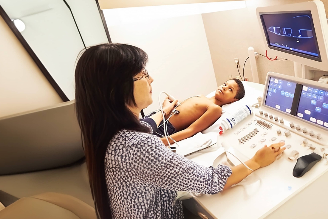 male patient receiving being tested wtih ultrasound