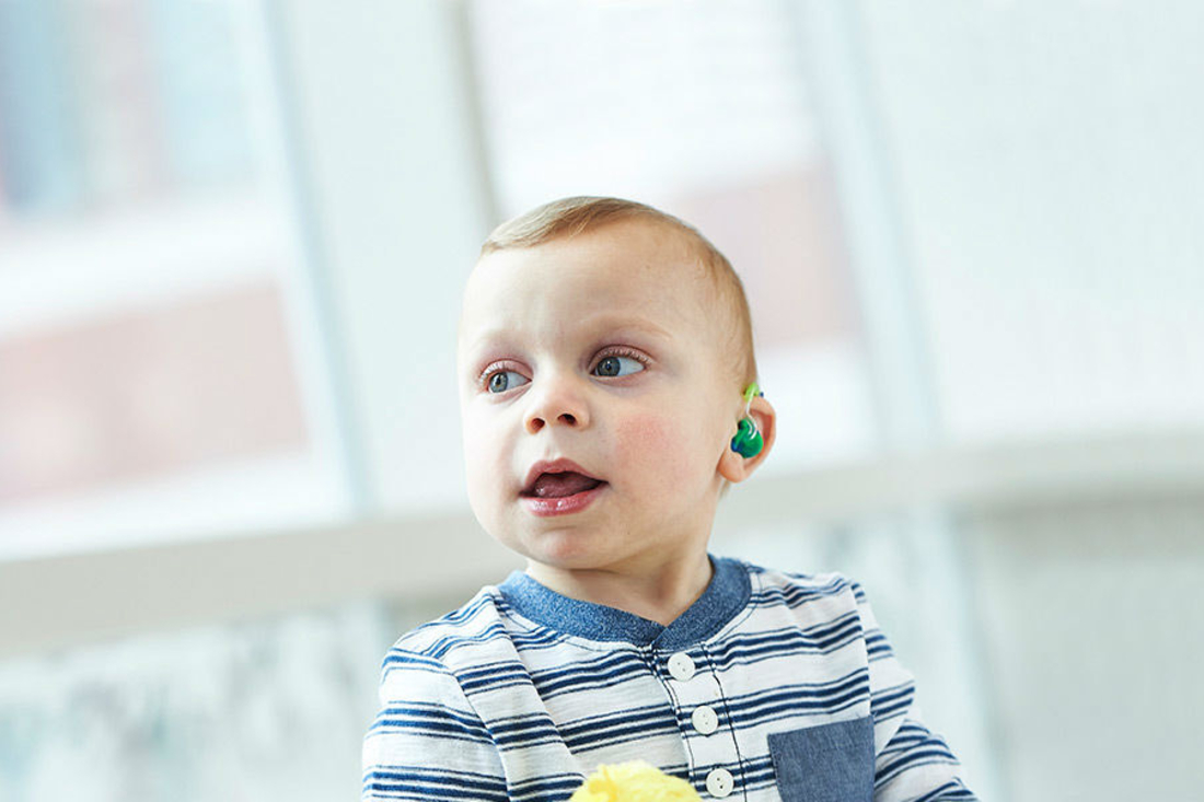 little boy looking off into distance