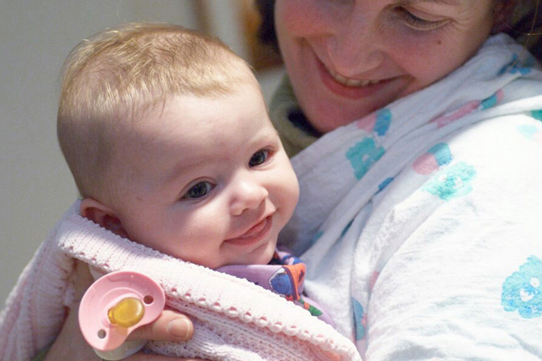 mother holding her baby