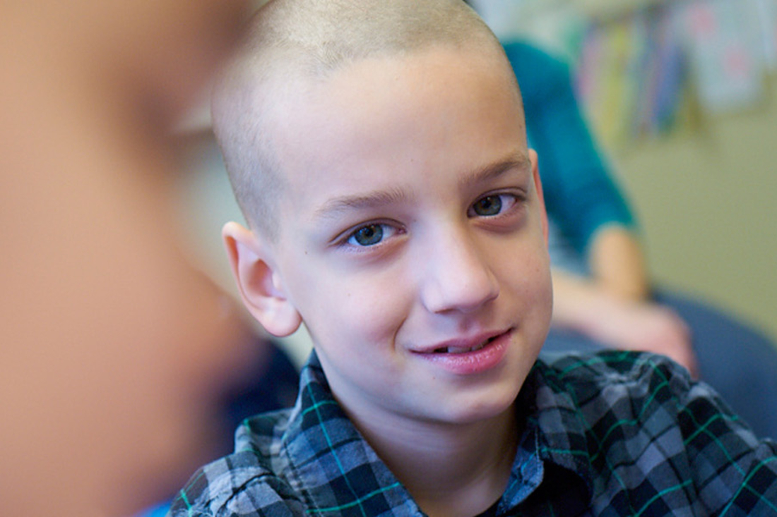 young boy looking at viewer