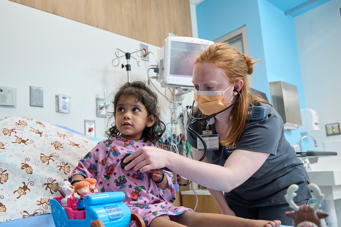 child with nurse
