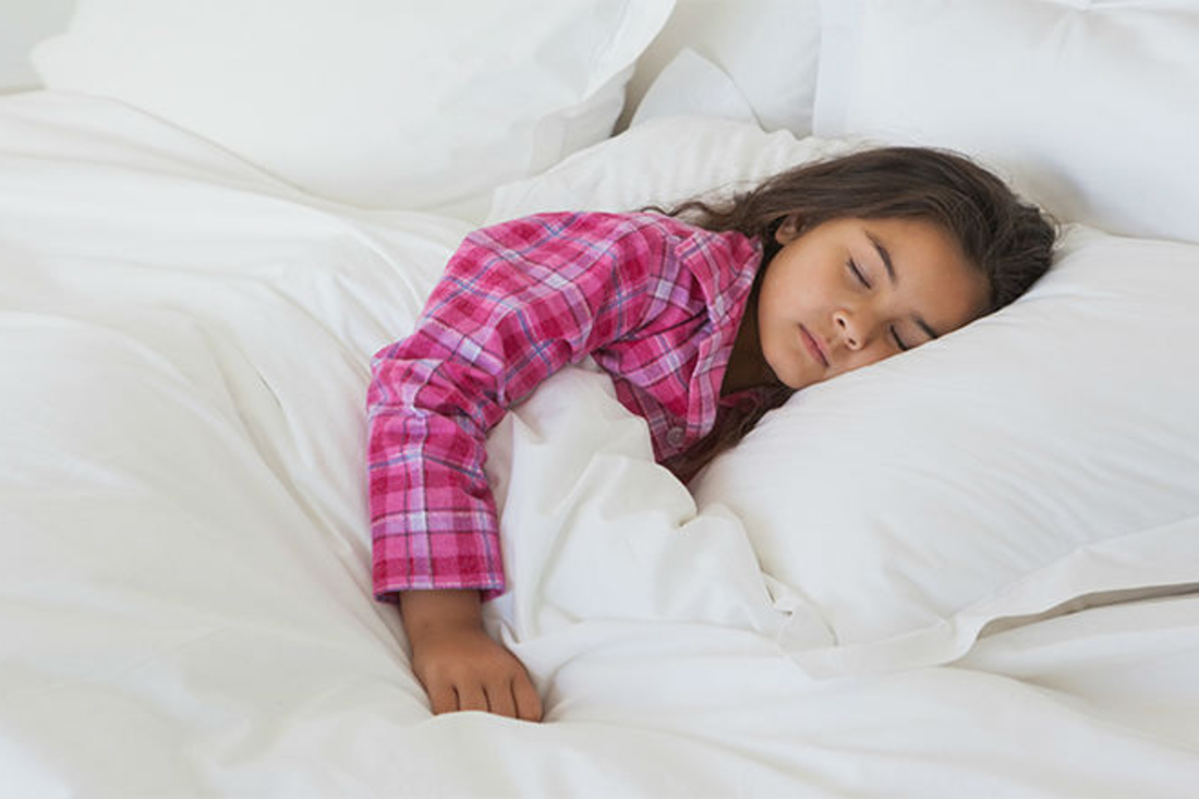 Older female toddler sleeping in bed Older female toddler sleeping in bed