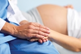 Compassionate moment between patient and staff