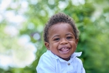 African American boy smiling in the hospital garden