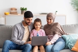 Family researching on their labtop