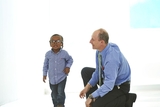 Doctor talking with young patient