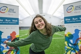 CHOP patient smiling at the Eagles Autism Challenge event