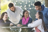 Group of teens talking and laughing