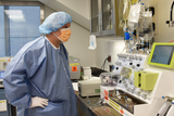 Lab employee in bunny suit