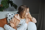 girl coughing pertussis. 