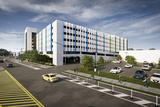 Rendering of a parking garage against blue sky.