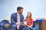 Physician with patient