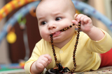 baby with beads