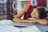 Girl asleep on books Girl asleep on books