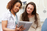 nurse and patient talking
