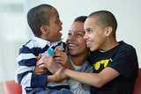 Mom with 2 sons smiling Mom with 2 sons smiling