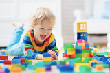 Gifts that are Great for Kids child playing with blocks