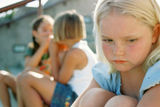 little girl frowning