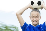 GIrl holding soccer ball GIrl holding soccer ball