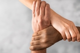 Hands of different races held together Hands of different races held together