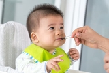 Young baby taking oral injection medicine Young baby taking oral injection medicine