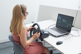 Teen using virtual driving assessment system Teen using virtual driving assessment system