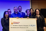 Group presenting check