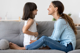 Mother and daughter talking