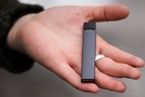 What you need to know about teen vaping hand holding vape