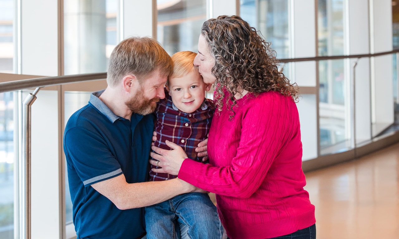 Alex with his mom and dad
