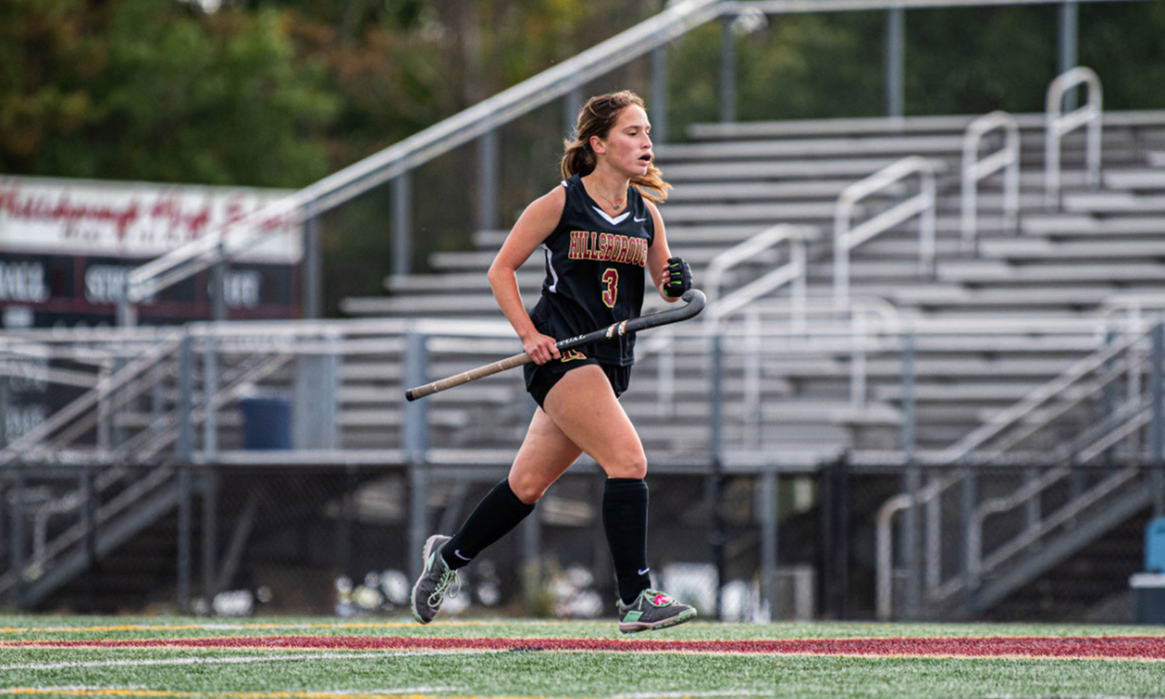 Paige playing field hockey