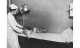 Babies with radiology equipment in 1921.