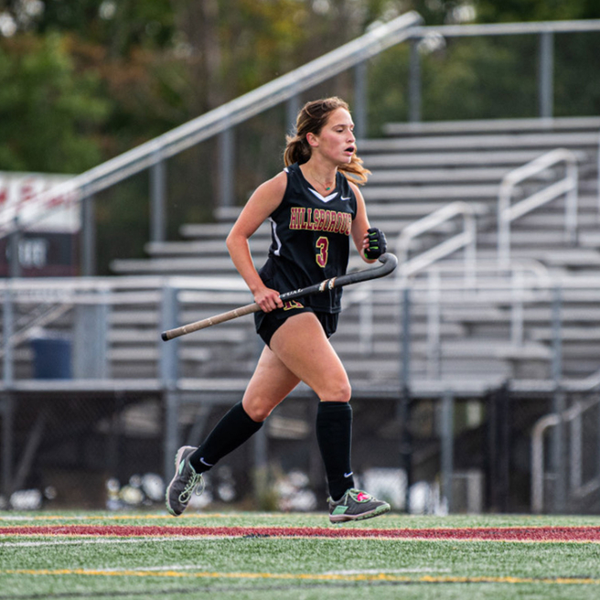 Paige playing field hockey