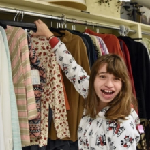 Cerebral palsy patient in thrift store smiling
